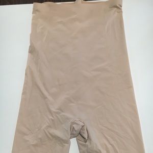 Spanx higher power shorts in nude, mid thigh